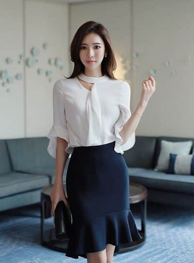 Áo sơ mi tay lỡ đã trở thành trào lưu đồng phục công sở nữ trong nhiều năm qua