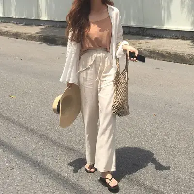 Mặc Áo thun màu cam 2 dây + Quần ống rộng cạp cao đi Phú Quốc