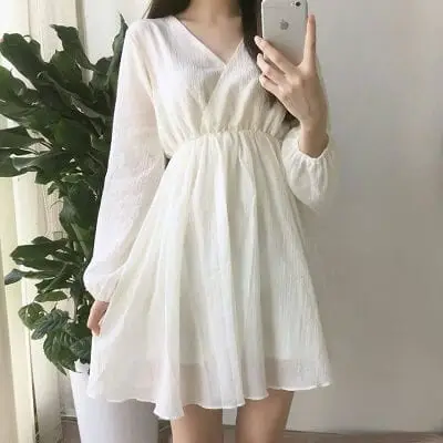 Đầm cổ v nhún eo màu trắng