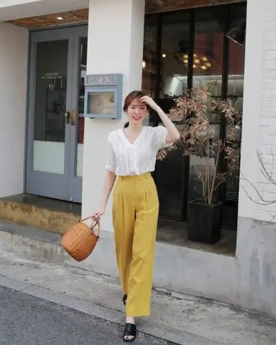 Quần dáng suông cạp cao “thuốc đặc trị” cho dáng người quả táo - Ảnh 4